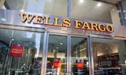 Wells Fargo Fires More Than 100 Workers for Abusing U.S. Aid