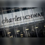 Schwab Taking $200 Million Charge for SEC Robo-Advisor Probe