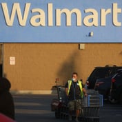 Walmart Lures Goldman Bankers in Bid to Fight Wall Street