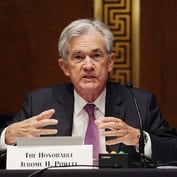 Powell Plays Down Inflation, Nods to Higher-Than-Expected Prices