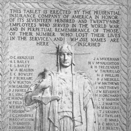 A monument featuring the image of a goddess, the names of employees who served and this statement, 