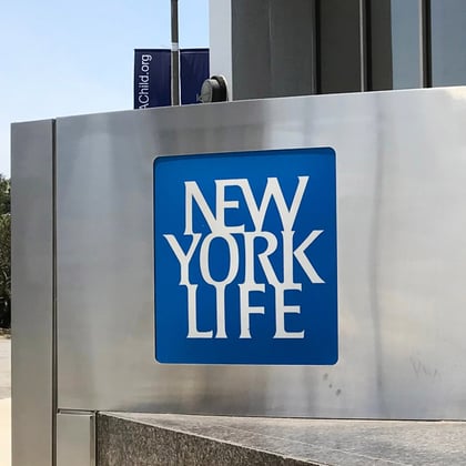 A New York Life sign, outside one of the company's offices in Los Angeles