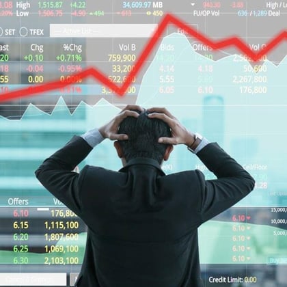 shutterstock image of anxious stock broker