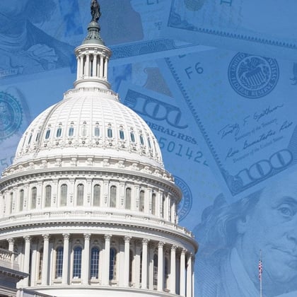 Adobe stock photo of US Capitol with dollars in the background
