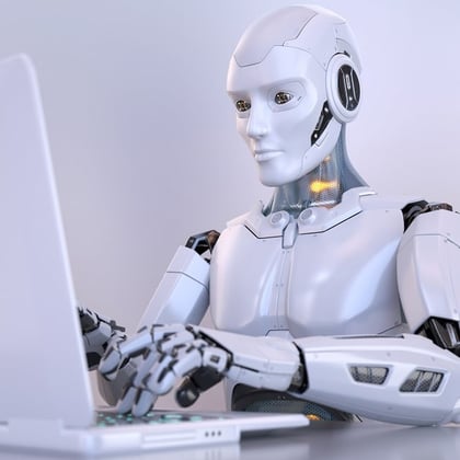 Robot working with laptop.Credit: Tatiana Shepeleva/Shutterstock.com