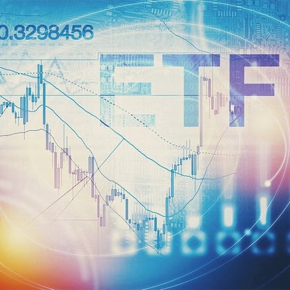 Blue and white image of a stock chart with he letters ETF in the upper right corner and a yellow globe in he lower left corner
