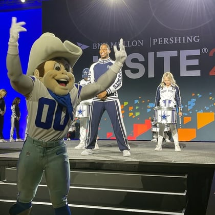 The Dallas Cowboys mascot and cheerleaders at Pershing Insite