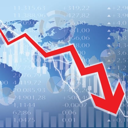 stock image of red arrow dropping over a map of globe and declining stock prices