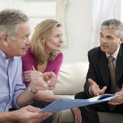 A couple with an advisor. (Image: Shutterstock)