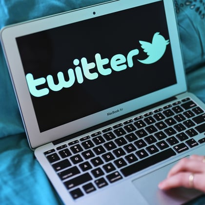 Twitter logo displayed on a laptop