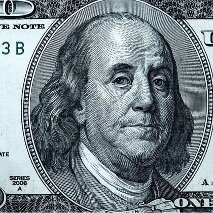 Ben Franklin on a hundred dollar bill