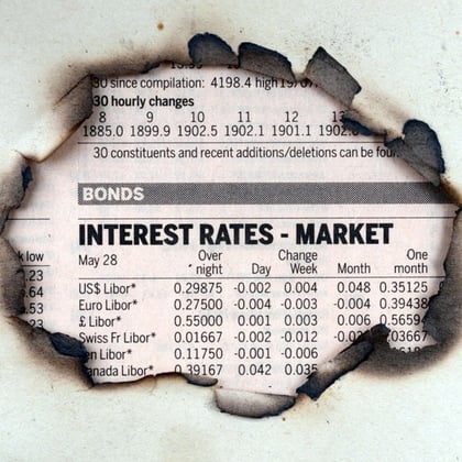 Interest rates on a newspaper