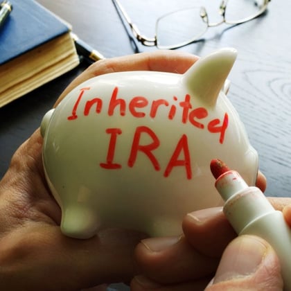 Inherited IRA written on piggy bank