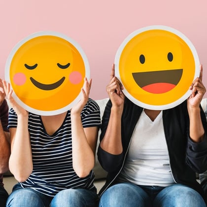 people holding happy emoticon