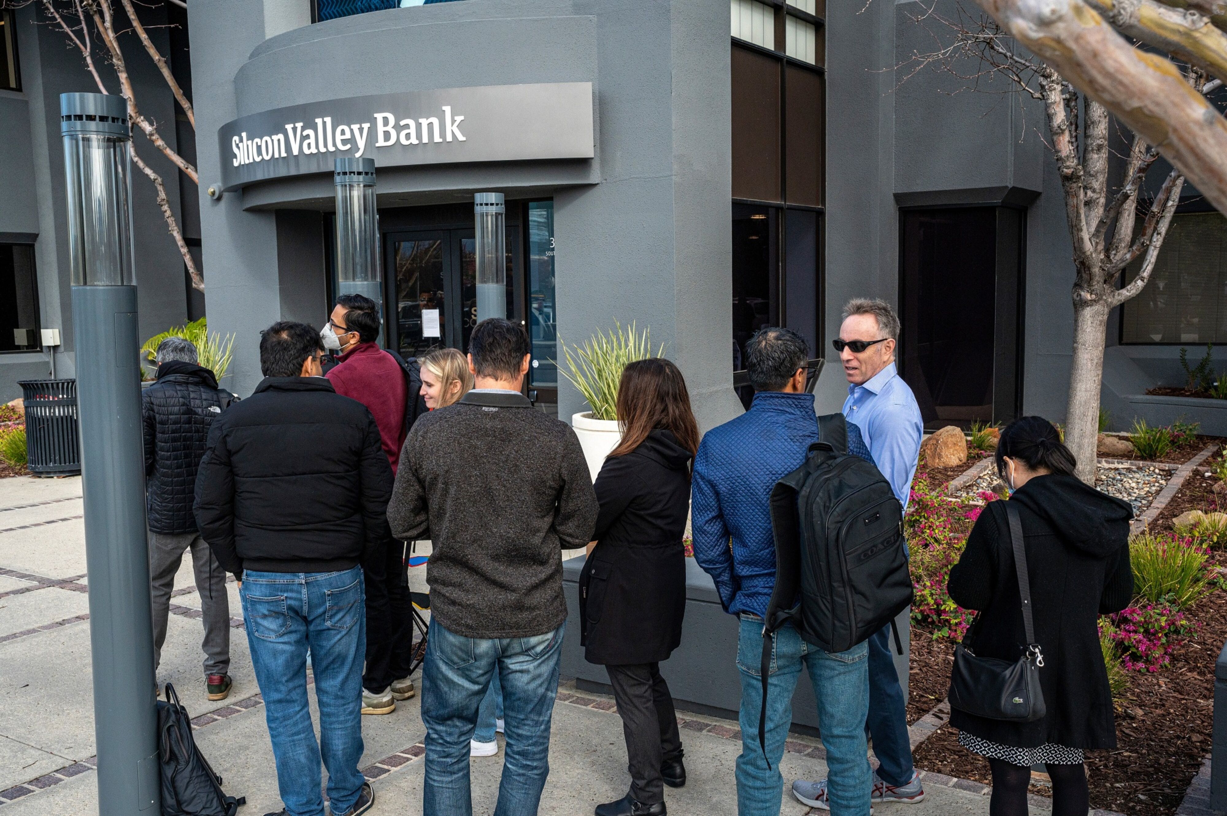 Customers outside Silicon Valley Bank headquarters in Santa Clara, California, on March 13.